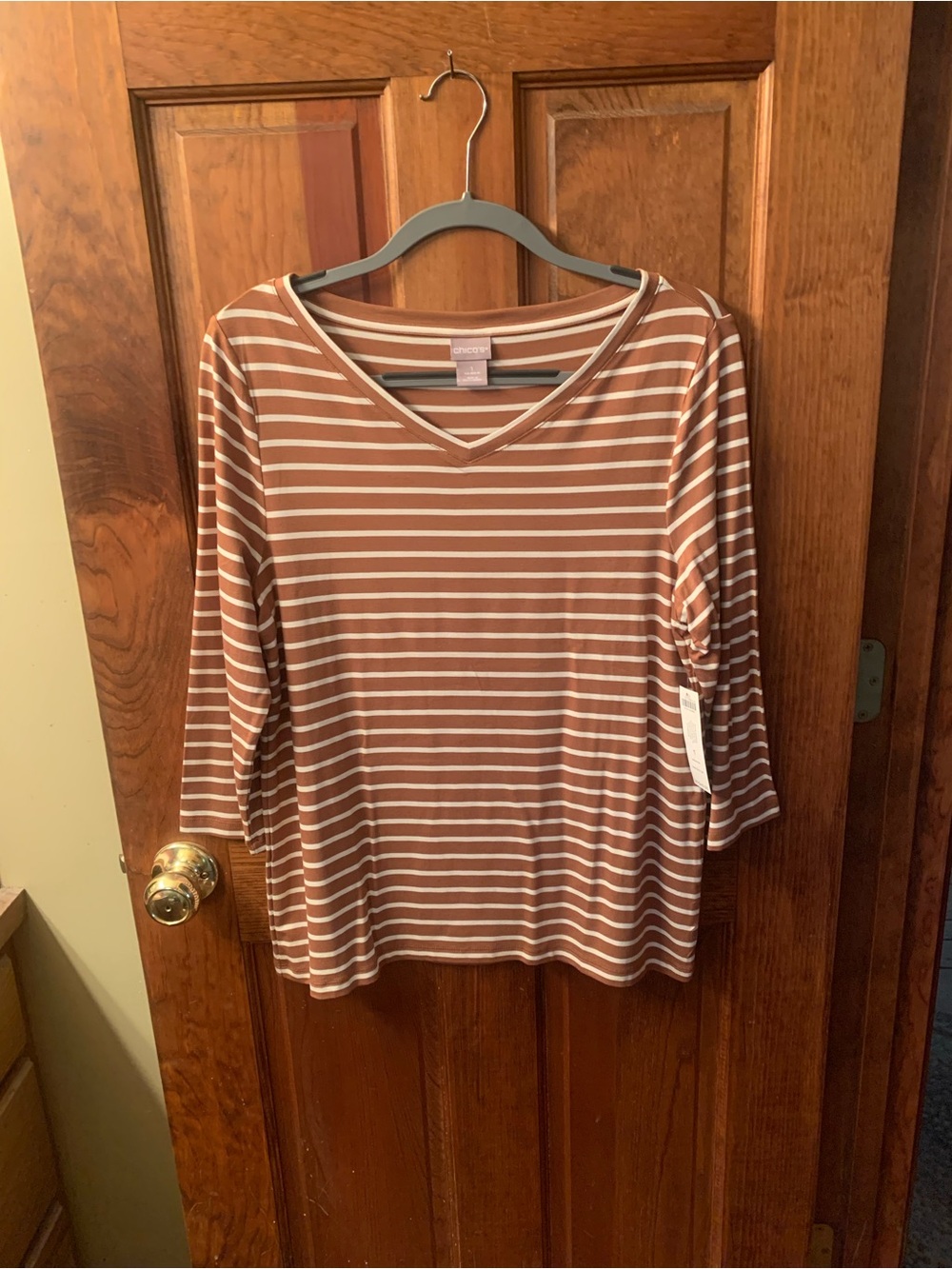 Chico, NEW WITH TAGS, V neck stripe tee. 3/4 sleeves, 95 Rayon and 5 Spandex.